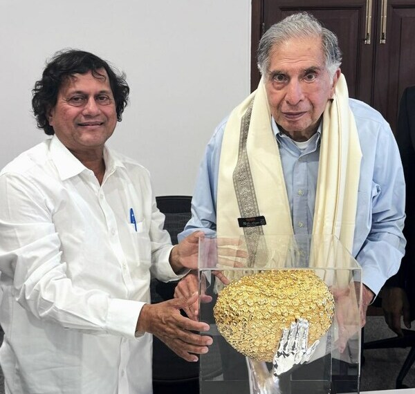 Mr. Ratan Naval Tata, Chairman Emeritus, Tata Sons, receiving the prestigious KISS Humanitarian Award 2021 from Prof. Achyuta Samanta, Founder, KIIT, KISS & KIMS, Bhubaneswar.