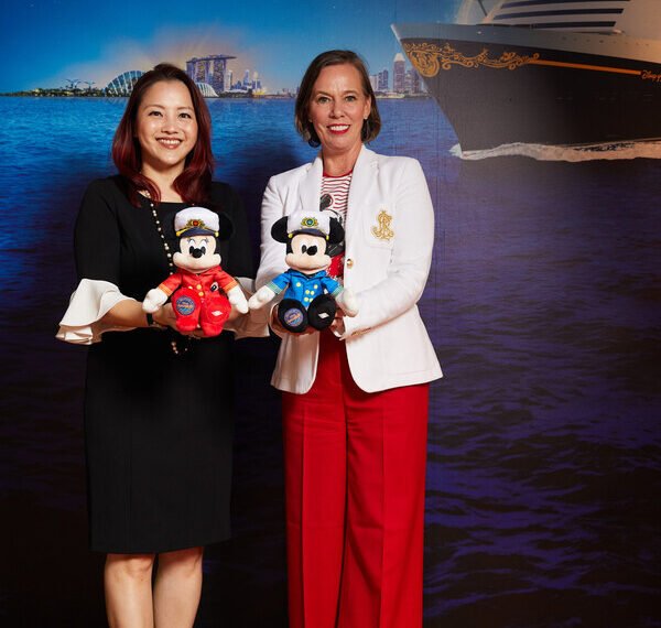 L-R: Ms Jacquelyn Tan, Head, Group Personal Financial Services, UOB, and Ms Sarah Fox, Vice President and Regional General Manager for Southeast Asia, Disney Cruise Line, showcasing the limited-edition Disney Cruise Line plushies of Captain Mickey Mouse and Captain Minnie Mouse.